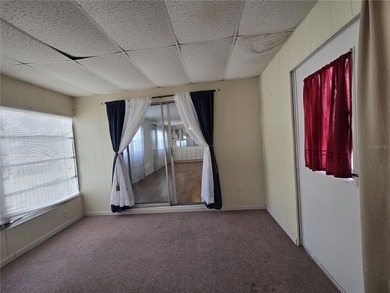 LAND OWNED 2-bedroom 2 bath manufactured home in Zellwood on Zellwood Station Country Club in Florida - for sale on GolfHomes.com, golf home, golf lot