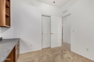 Located in the coveted Estrella Mountain Ranch community, this on Estrella Mountain Ranch Golf Course in Arizona - for sale on GolfHomes.com, golf home, golf lot