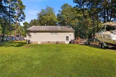 Welcome to this beautifully maintained 2-bedroom, 2 full bath on Piankatank River Golf Club in Virginia - for sale on GolfHomes.com, golf home, golf lot
