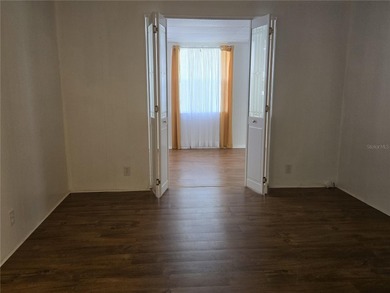 LAND OWNED 2-bedroom 2 bath manufactured home in Zellwood on Zellwood Station Country Club in Florida - for sale on GolfHomes.com, golf home, golf lot