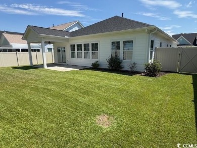 This beautiful 4-bedroom, 2-bathroom home is located in the on Surf Golf and Beach Club in South Carolina - for sale on GolfHomes.com, golf home, golf lot