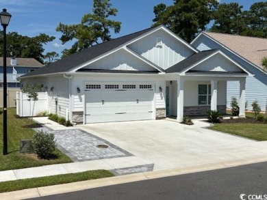 This beautiful 4-bedroom, 2-bathroom home is located in the on Surf Golf and Beach Club in South Carolina - for sale on GolfHomes.com, golf home, golf lot
