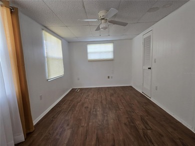 LAND OWNED 2-bedroom 2 bath manufactured home in Zellwood on Zellwood Station Country Club in Florida - for sale on GolfHomes.com, golf home, golf lot