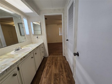 LAND OWNED 2-bedroom 2 bath manufactured home in Zellwood on Zellwood Station Country Club in Florida - for sale on GolfHomes.com, golf home, golf lot