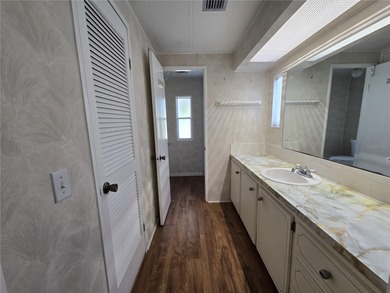 LAND OWNED 2-bedroom 2 bath manufactured home in Zellwood on Zellwood Station Country Club in Florida - for sale on GolfHomes.com, golf home, golf lot