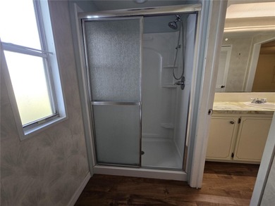 LAND OWNED 2-bedroom 2 bath manufactured home in Zellwood on Zellwood Station Country Club in Florida - for sale on GolfHomes.com, golf home, golf lot