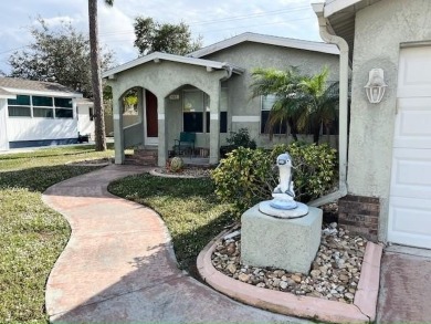If you've been searching for a quaint, affordable stucco home on Del Tura Golf and Country Club in Florida - for sale on GolfHomes.com, golf home, golf lot