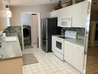 Beautifully maintained 3BR/2BA home in a quiet 55+ community on Fairways Country Club in Florida - for sale on GolfHomes.com, golf home, golf lot