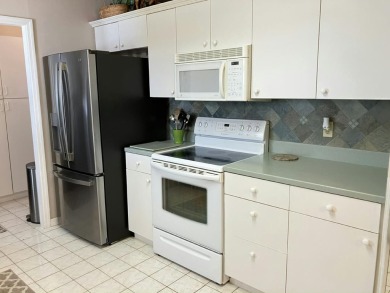Beautifully maintained 3BR/2BA home in a quiet 55+ community on Fairways Country Club in Florida - for sale on GolfHomes.com, golf home, golf lot