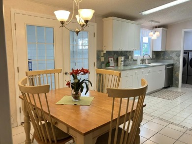 Beautifully maintained 3BR/2BA home in a quiet 55+ community on Fairways Country Club in Florida - for sale on GolfHomes.com, golf home, golf lot