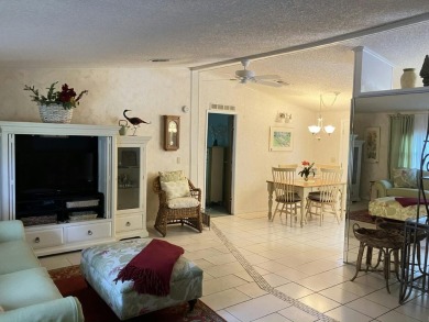 Beautifully maintained 3BR/2BA home in a quiet 55+ community on Fairways Country Club in Florida - for sale on GolfHomes.com, golf home, golf lot