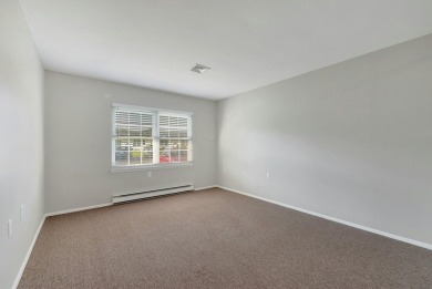 Move right into this beautifully maintained two-bedroom on Leisure Village Golf Course in New York - for sale on GolfHomes.com, golf home, golf lot