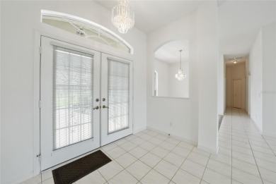 Explore this EXPANSIVE residence featuring a SPLIT BEDROOM on Pinemoor West Golf Club in Florida - for sale on GolfHomes.com, golf home, golf lot