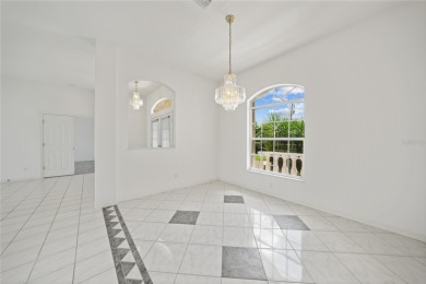 Explore this EXPANSIVE residence featuring a SPLIT BEDROOM on Pinemoor West Golf Club in Florida - for sale on GolfHomes.com, golf home, golf lot