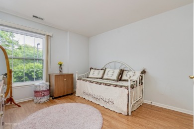 Stunning second floor unit with gorgeous panoramic golf course on The Links at Carillon in Illinois - for sale on GolfHomes.com, golf home, golf lot