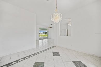 Explore this EXPANSIVE residence featuring a SPLIT BEDROOM on Pinemoor West Golf Club in Florida - for sale on GolfHomes.com, golf home, golf lot