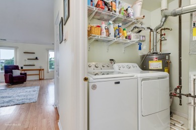 Stunning second floor unit with gorgeous panoramic golf course on The Links at Carillon in Illinois - for sale on GolfHomes.com, golf home, golf lot