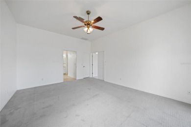 Explore this EXPANSIVE residence featuring a SPLIT BEDROOM on Pinemoor West Golf Club in Florida - for sale on GolfHomes.com, golf home, golf lot