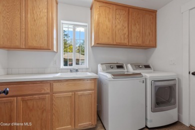 Tucked away in one of North Idaho's most desirable neighborhoods on Hayden Lake Country Club in Idaho - for sale on GolfHomes.com, golf home, golf lot