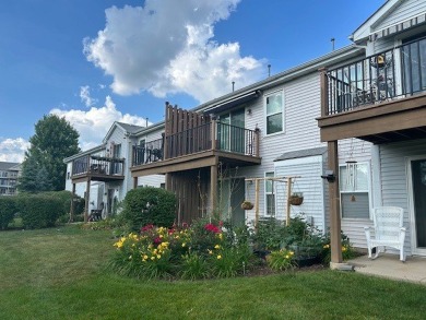 Stunning second floor unit with gorgeous panoramic golf course on The Links at Carillon in Illinois - for sale on GolfHomes.com, golf home, golf lot