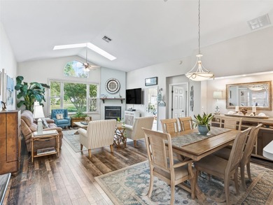 This beautifully maintained concrete block and stucco 'Doral' on Royal Oaks Golf Club in Florida - for sale on GolfHomes.com, golf home, golf lot