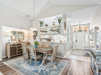 This beautifully maintained concrete block and stucco 'Doral' on Royal Oaks Golf Club in Florida - for sale on GolfHomes.com, golf home, golf lot