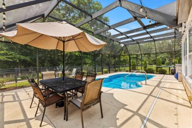 Enjoy your own private, heated pool with a screened enclosure on TPC of Myrtle Beach in South Carolina - for sale on GolfHomes.com, golf home, golf lot