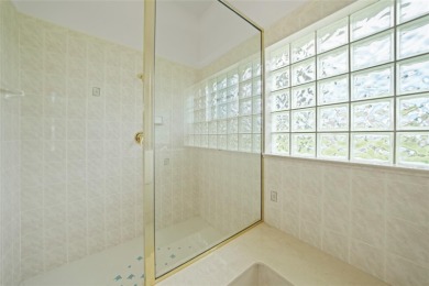 Explore this EXPANSIVE residence featuring a SPLIT BEDROOM on Pinemoor West Golf Club in Florida - for sale on GolfHomes.com, golf home, golf lot