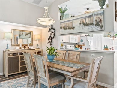 This beautifully maintained concrete block and stucco 'Doral' on Royal Oaks Golf Club in Florida - for sale on GolfHomes.com, golf home, golf lot