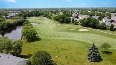 Stunning second floor unit with gorgeous panoramic golf course on The Links at Carillon in Illinois - for sale on GolfHomes.com, golf home, golf lot
