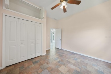 Explore this EXPANSIVE residence featuring a SPLIT BEDROOM on Pinemoor West Golf Club in Florida - for sale on GolfHomes.com, golf home, golf lot
