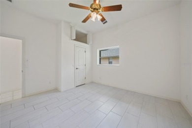 Explore this EXPANSIVE residence featuring a SPLIT BEDROOM on Pinemoor West Golf Club in Florida - for sale on GolfHomes.com, golf home, golf lot