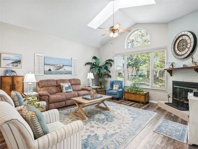 This beautifully maintained concrete block and stucco 'Doral' on Royal Oaks Golf Club in Florida - for sale on GolfHomes.com, golf home, golf lot