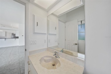 Explore this EXPANSIVE residence featuring a SPLIT BEDROOM on Pinemoor West Golf Club in Florida - for sale on GolfHomes.com, golf home, golf lot