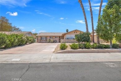 Nestled in a serene Palm Desert neighborhood, this beautifully on Palm Desert Country Club in California - for sale on GolfHomes.com, golf home, golf lot