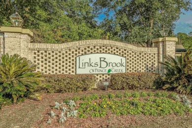 Enjoy your own private, heated pool with a screened enclosure on TPC of Myrtle Beach in South Carolina - for sale on GolfHomes.com, golf home, golf lot