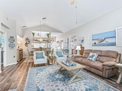 This beautifully maintained concrete block and stucco 'Doral' on Royal Oaks Golf Club in Florida - for sale on GolfHomes.com, golf home, golf lot