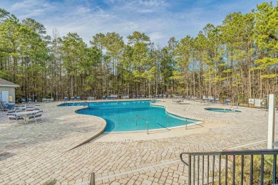 Enjoy your own private, heated pool with a screened enclosure on TPC of Myrtle Beach in South Carolina - for sale on GolfHomes.com, golf home, golf lot