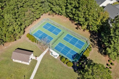 Enjoy your own private, heated pool with a screened enclosure on TPC of Myrtle Beach in South Carolina - for sale on GolfHomes.com, golf home, golf lot
