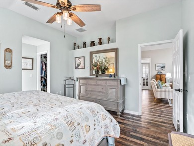 This beautifully maintained concrete block and stucco 'Doral' on Royal Oaks Golf Club in Florida - for sale on GolfHomes.com, golf home, golf lot