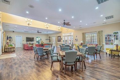 Enjoy your own private, heated pool with a screened enclosure on TPC of Myrtle Beach in South Carolina - for sale on GolfHomes.com, golf home, golf lot