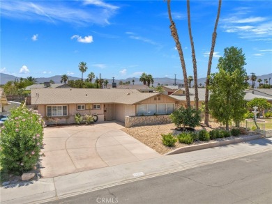 Nestled in a serene Palm Desert neighborhood, this beautifully on Palm Desert Country Club in California - for sale on GolfHomes.com, golf home, golf lot