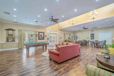 Enjoy your own private, heated pool with a screened enclosure on TPC of Myrtle Beach in South Carolina - for sale on GolfHomes.com, golf home, golf lot