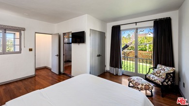 Introducing the Howard Hughes Estate, an iconic Spanish Revival on Wilshire Country Club in California - for sale on GolfHomes.com, golf home, golf lot