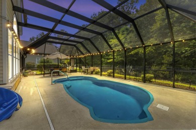 Enjoy your own private, heated pool with a screened enclosure on TPC of Myrtle Beach in South Carolina - for sale on GolfHomes.com, golf home, golf lot