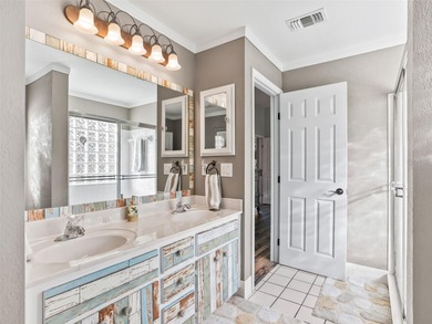 This beautifully maintained concrete block and stucco 'Doral' on Royal Oaks Golf Club in Florida - for sale on GolfHomes.com, golf home, golf lot