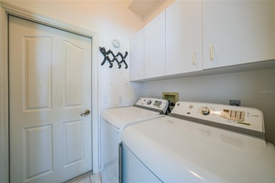 Explore this EXPANSIVE residence featuring a SPLIT BEDROOM on Pinemoor West Golf Club in Florida - for sale on GolfHomes.com, golf home, golf lot