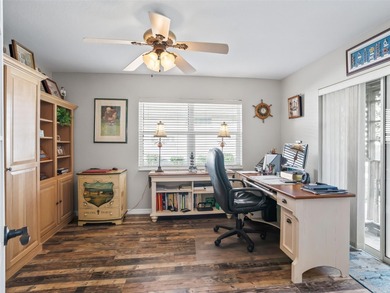 This beautifully maintained concrete block and stucco 'Doral' on Royal Oaks Golf Club in Florida - for sale on GolfHomes.com, golf home, golf lot