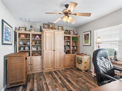 This beautifully maintained concrete block and stucco 'Doral' on Royal Oaks Golf Club in Florida - for sale on GolfHomes.com, golf home, golf lot