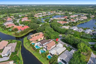 Lovely lakefront four bedroom plus den/office Patio C home with on Frenchmans Creek Country Club in Florida - for sale on GolfHomes.com, golf home, golf lot